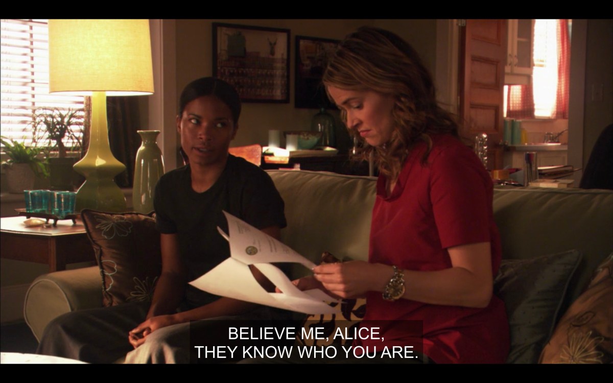 Tasha and Alice sitting on Alice's couch, Alice reading the report on Tasha'a homosexual conduct. Caption says "believe me, Alice, they know who you are."