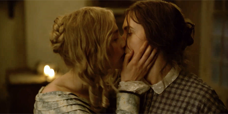 Kate Winslet and Saoirse Ronan kiss in the screener for the film Ammonite.