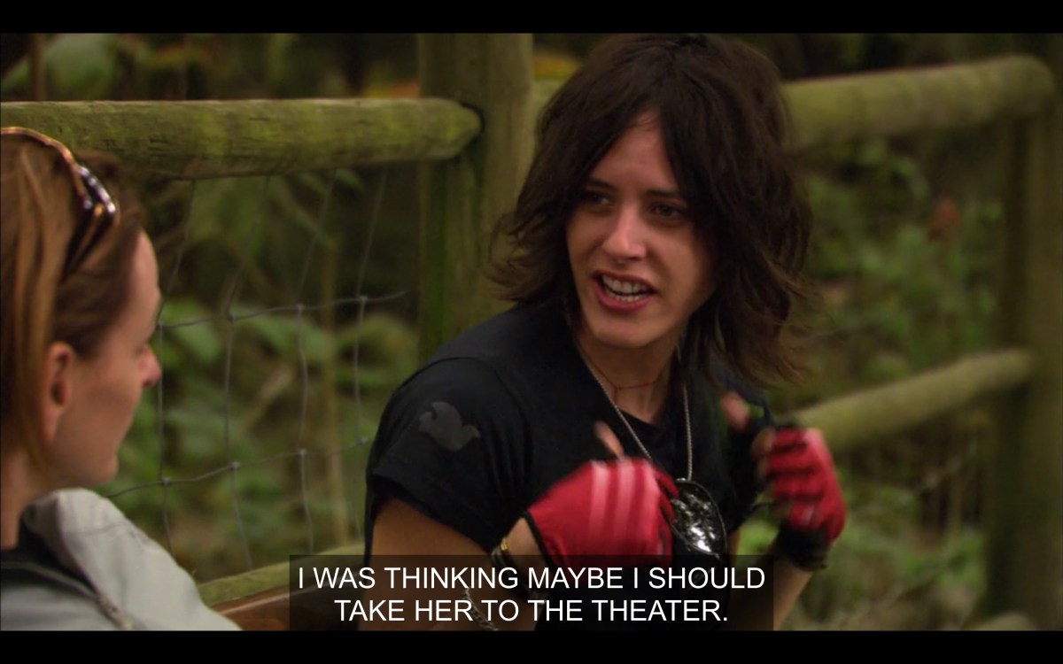 Shane talking to Jodi on a bench after a bike ride