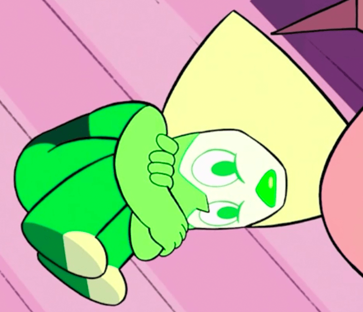 Peridot sad curled in a ball