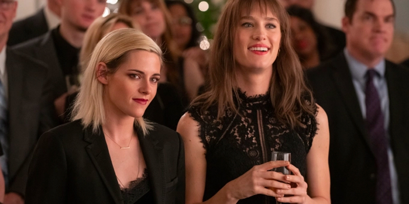 Kristen Stewart and Mackenzie Davis in Happiest Season.