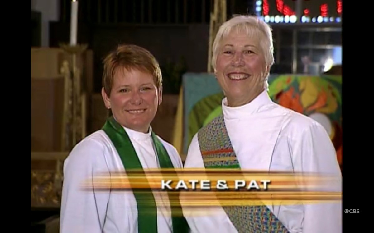 lesbian ministers Kate + Pat smiling at the camera in the opening credits