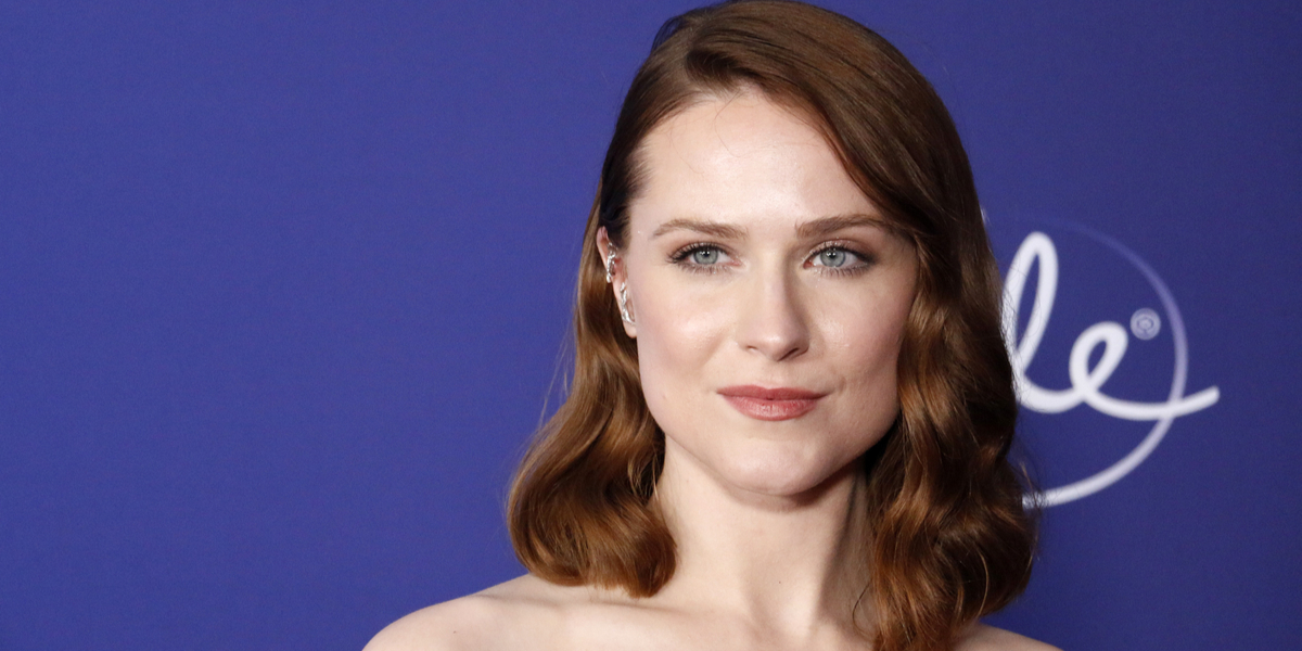 A red carpet photo of Evan Rachel Wood with shoulder-length red hair