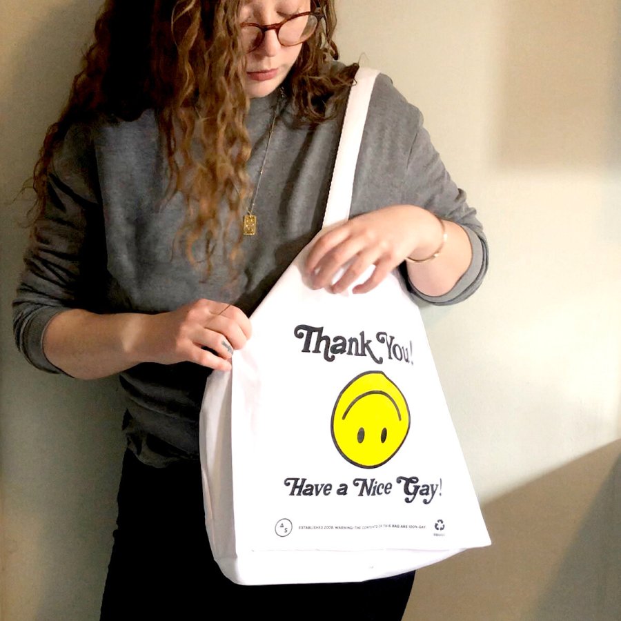 Rachel with "Thank You Have a Nice Gay" tote bag