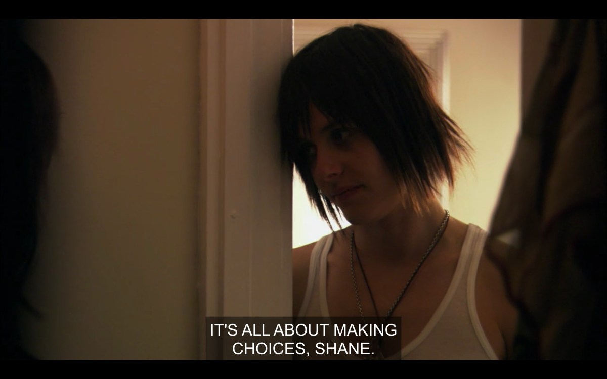 Shane leaning on the closet door while Jenny tells her to make choices