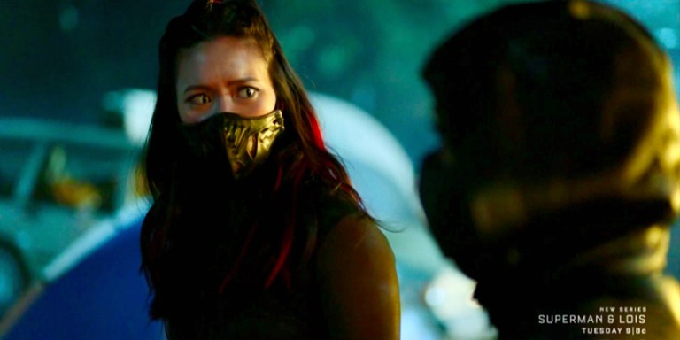 Grace Choi is prepared for a fight, she's disguised herself with red hair and green cat eyes and an inordinate black mask.