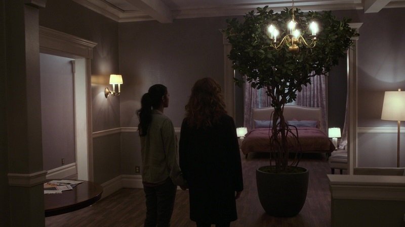 This week on New Amsterdam, Lauren and her new roommate, Leyla, hold hands before their new shared tree.