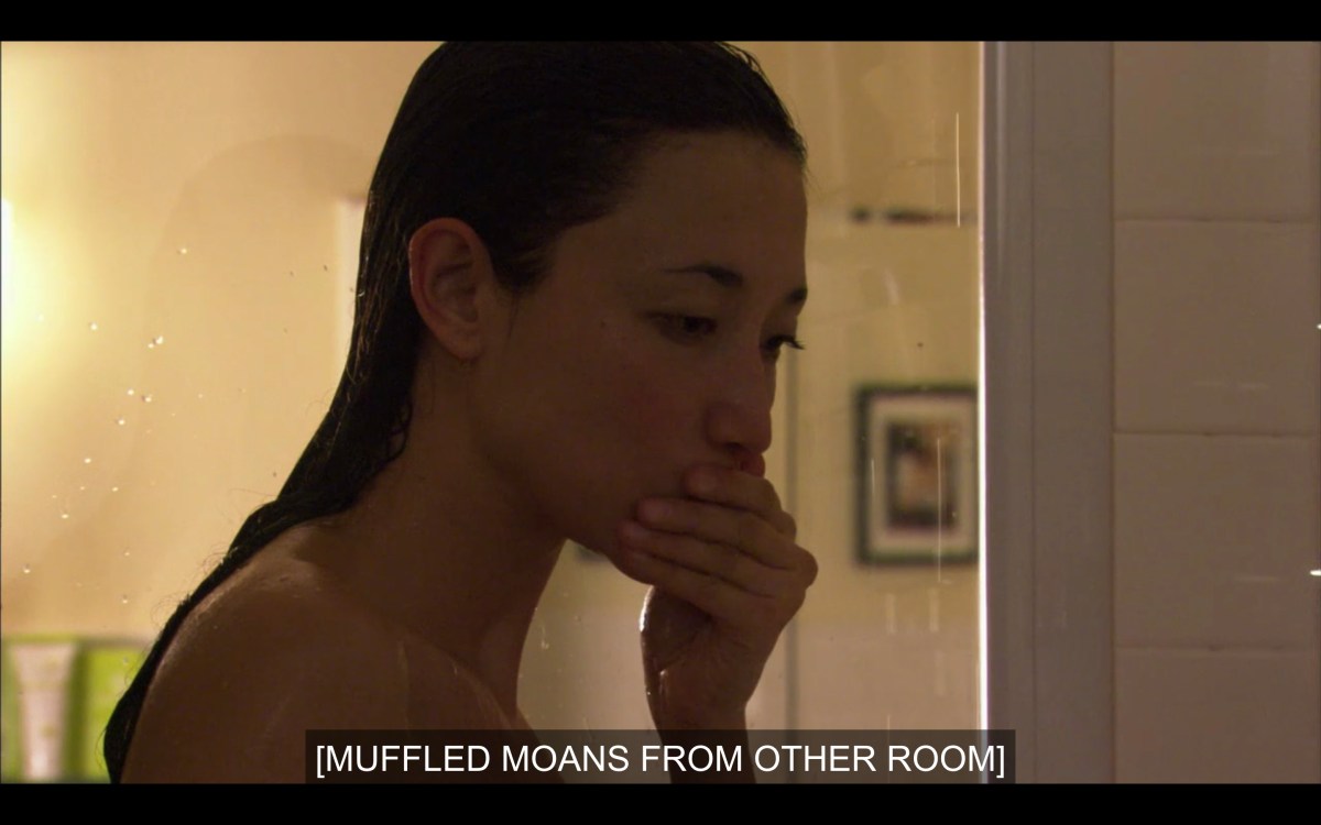 Jamie just got out of the shower and is listening to "muffled moans from the other room"