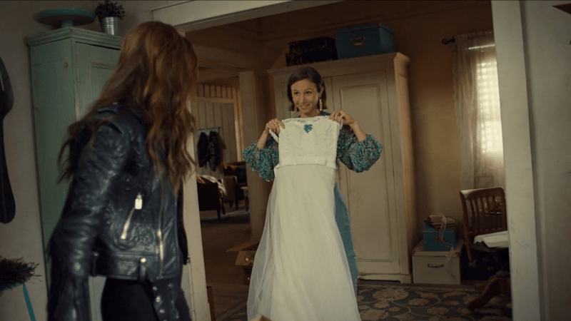 Wynonna Earp series finale recapWaverly holds up her wedding dress for Wynonna.