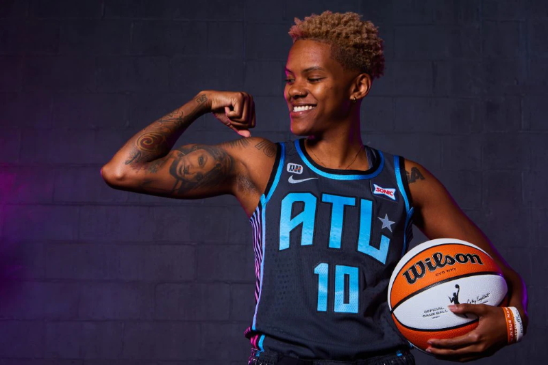 The Atlanta Dream's Courtney Williams shows off the new Rebel Edition jersey.