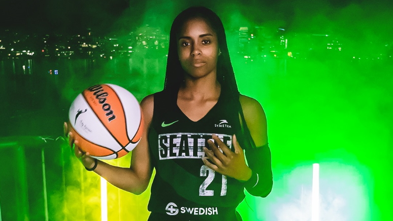 Storm guard Jordin Canada shows off Seattle's new Rebel Edition jersey.