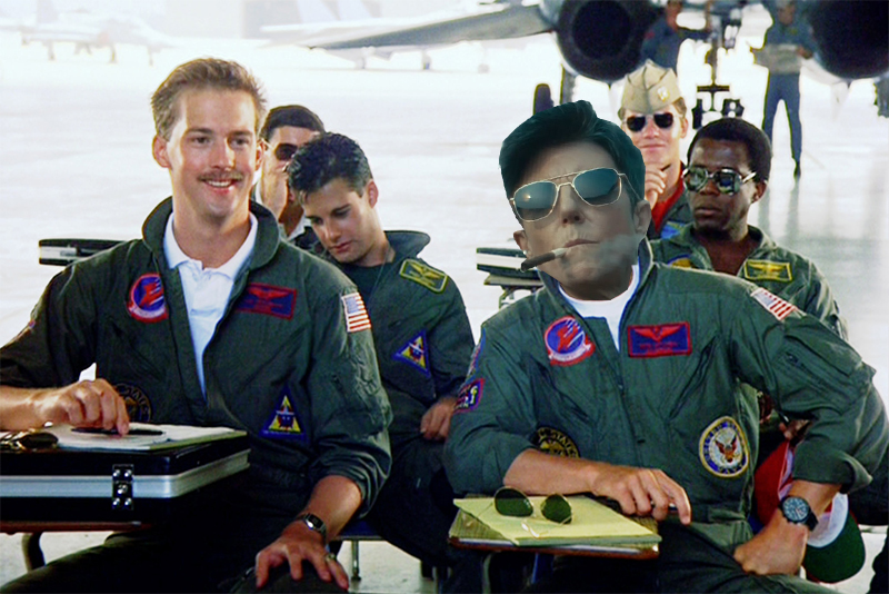 Tig Notaro Photoshopped into Top Gun wearing in aviators and a flight jump suit 