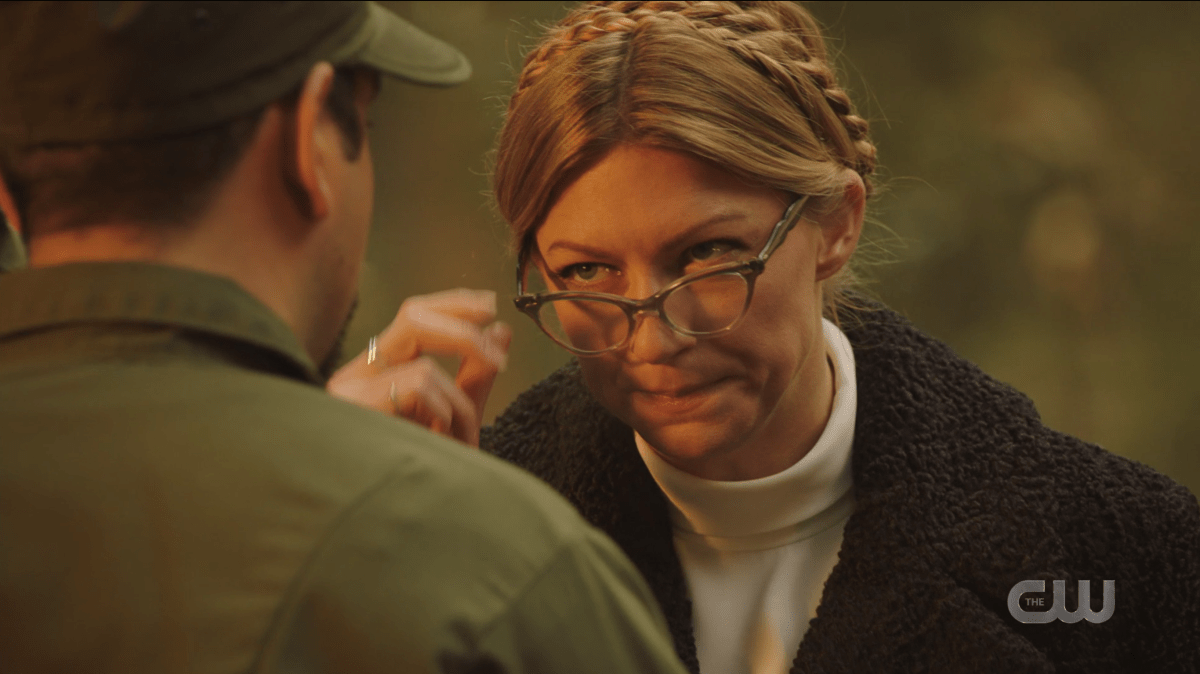 Legends of Tomorrow Episode 604: Ava looks down her costume glasses at a soldier. 