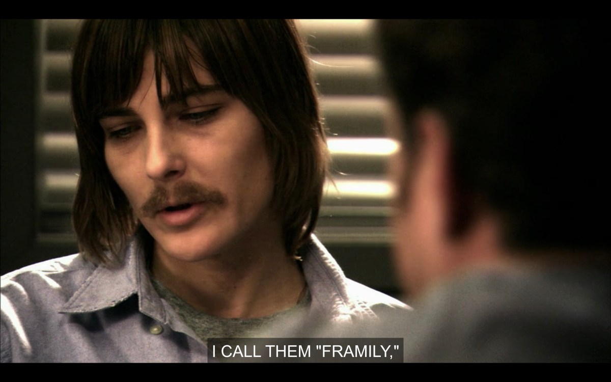 Max is saying "I call them 'framily'" in the interrogation room with his moustache