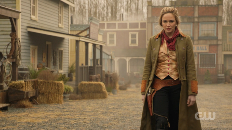 Legends of Tomorrow Episode 608: Sara walks coolly toward the shooting sheriff.