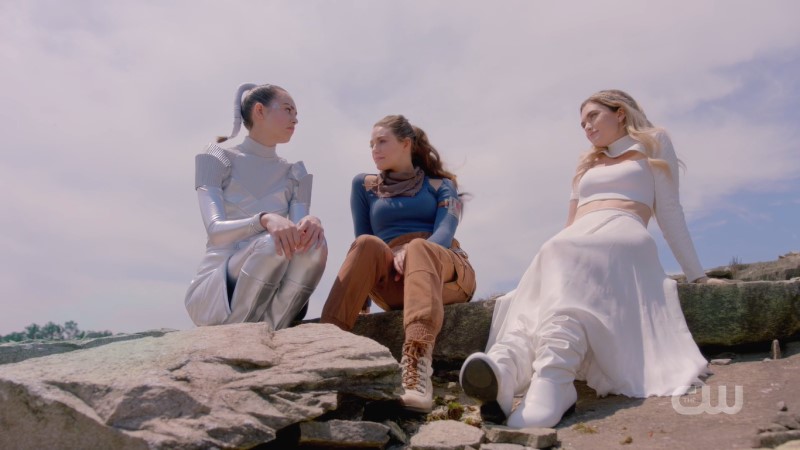 Legacies screenshot: Josie, hope and Lizzie sit on a star wars set 