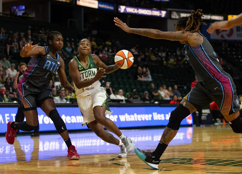 Jewell Loyd splits two defenders to get to the basket in a game earlier this year against the Atlanta Dream.