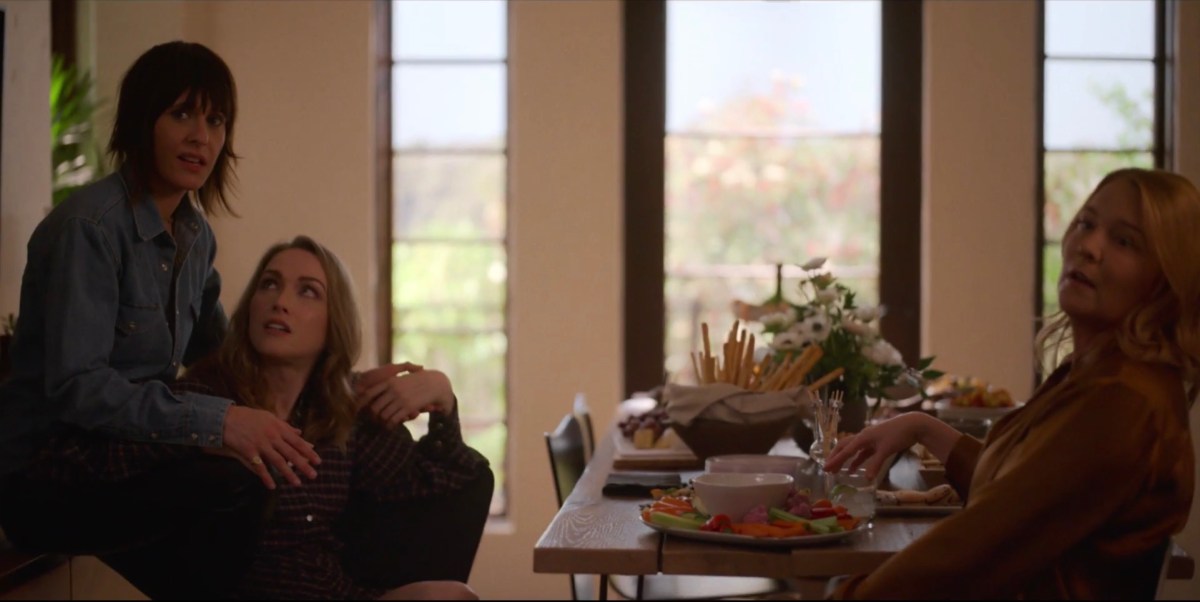 Tess, Shane and Tina sitting at the snacks area