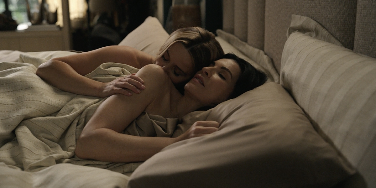 Reese Witherspoon and Julianna Margulies in bed in The Morning Show 