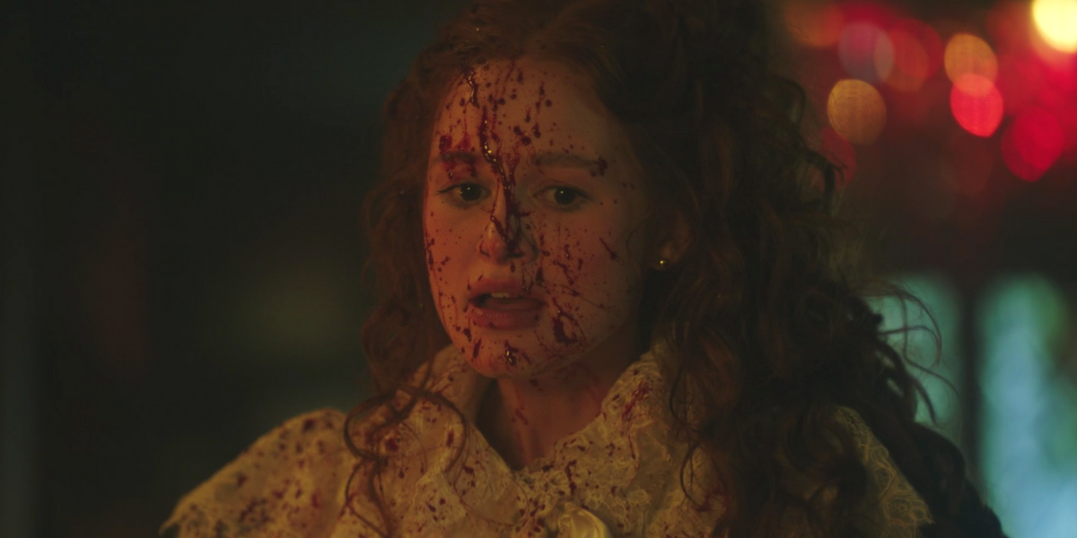 Abigail Blossom covered in blood spatter in the Riverdale/Sabrina crossover episode