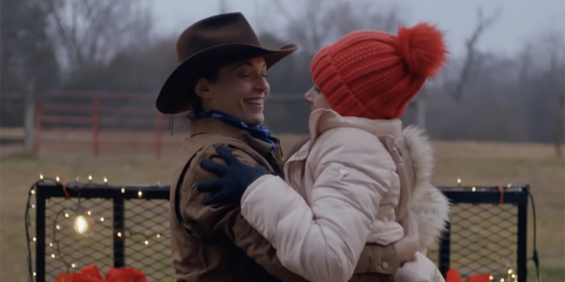 Haley and Kate accidentally falling into each other's arms on the hayride