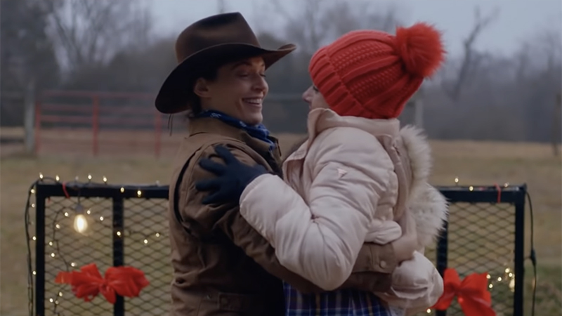 Haley and Kate accidentally falling into each other's arms on the hayride