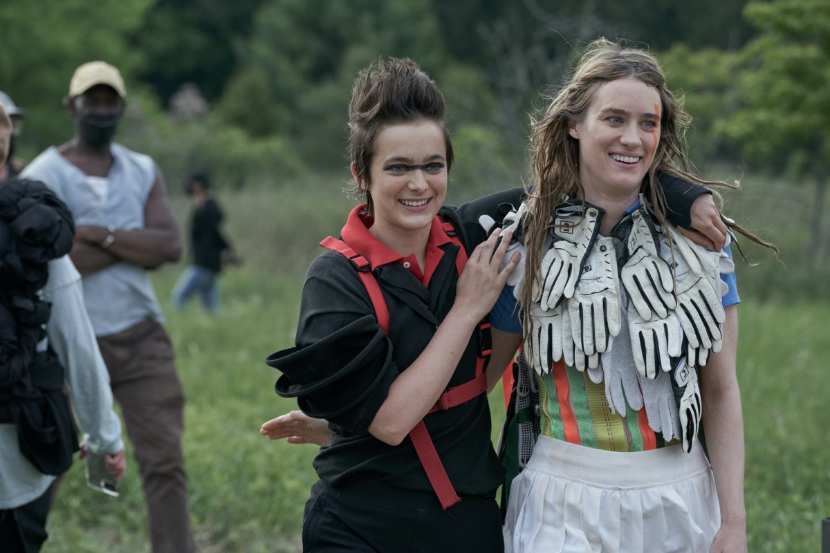 alex and kristen after a performance in "Station Eleven" in their weird costumes