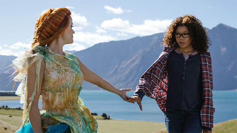 Meg in A Wrinkle in Time standing in front of a mountain and lake