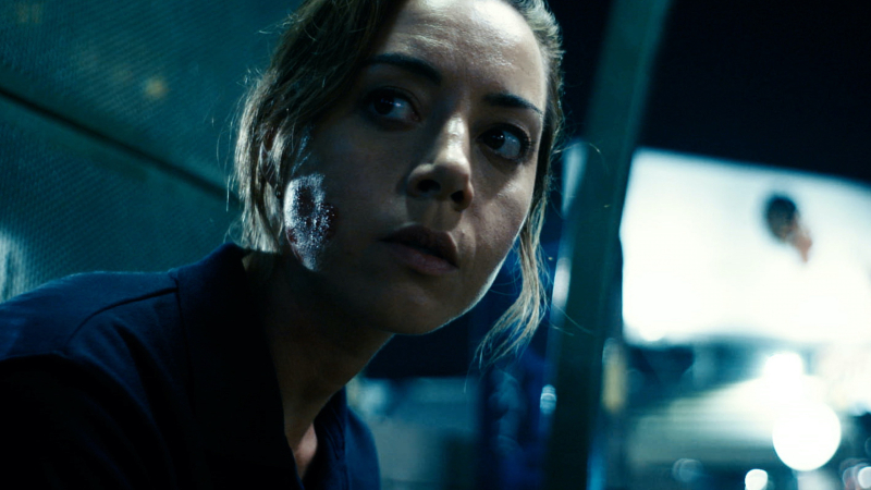 A close up of Aubrey Plaza looking concerned.