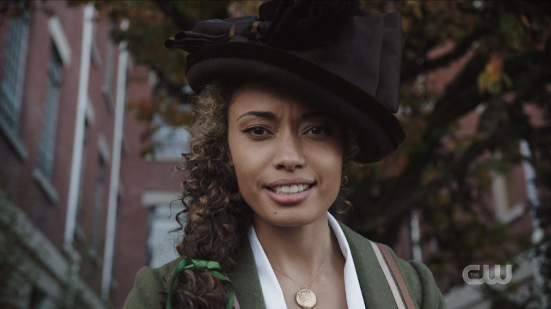 Close up of Astra in her cute hat looking straight to camera