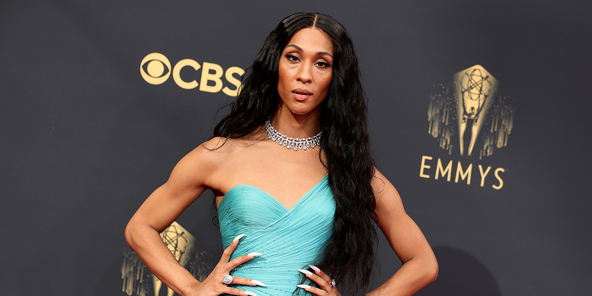 Michaela Jaé Rodriguez attends the 73rd Primetime Emmy Awards in a turquoise dress and a diamond choker necklace