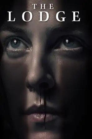 The Lodge movie cover. There is a white woman's face, blood coming out of her nose, and a cross made out of light on her face and crosses reflected in her eyes.