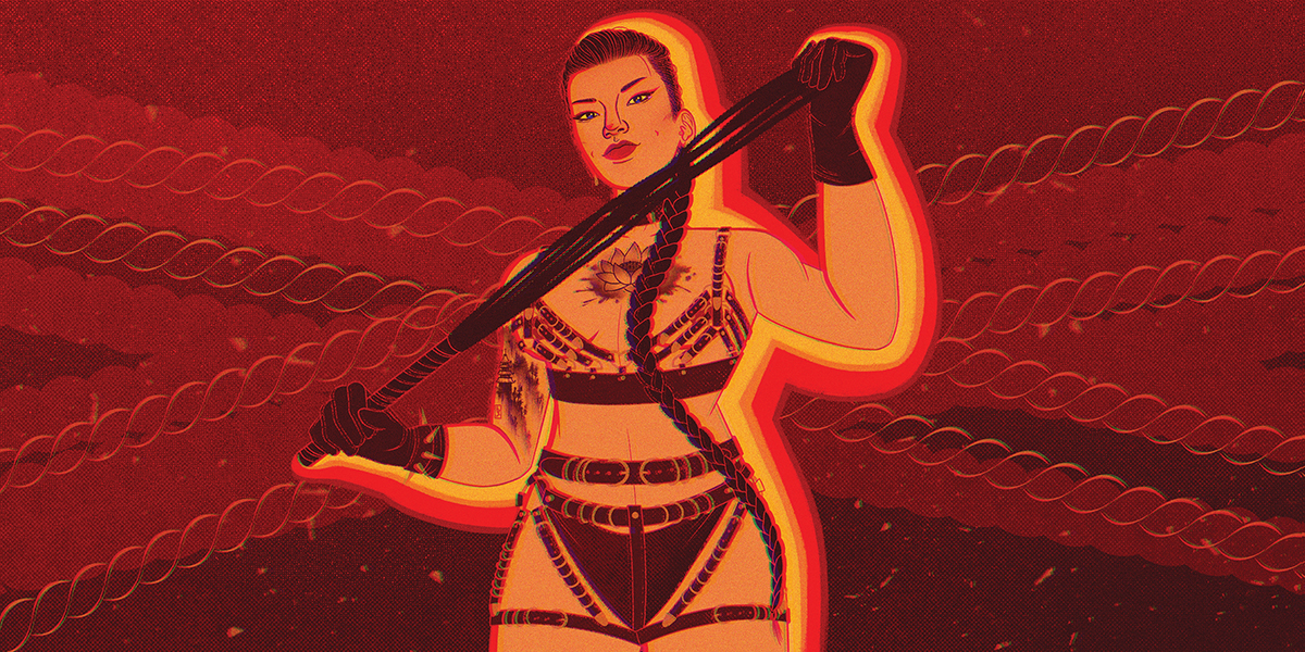 An Asian woman stand against a red background, wearing a leather, strappy underwear / harness situation. She holds a leather flogger that she stretches out between her gloved hands while eyeing the viewer. She has a chest tattoo and wears her hair in a long, single braid that winds down her front.