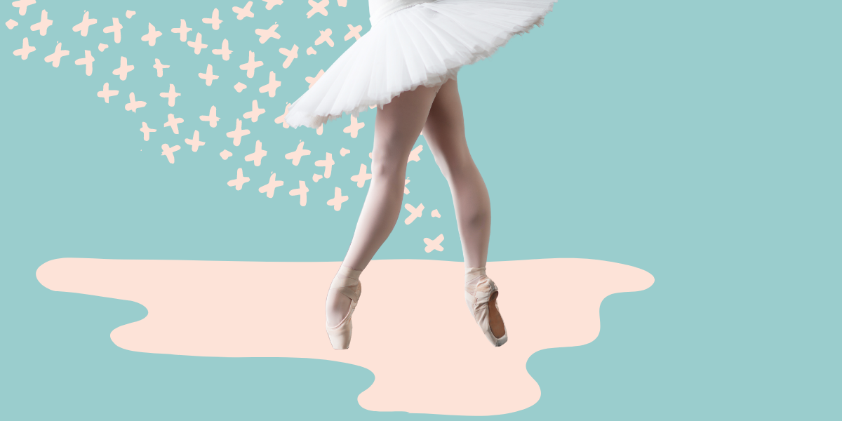 A ballerina in a wide white tutu on pointe