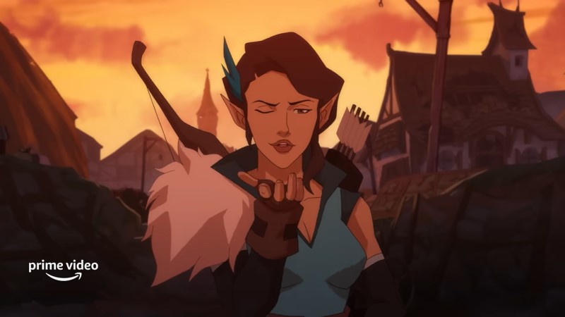 Vex looks to "camera" and winks while blowing a kiss