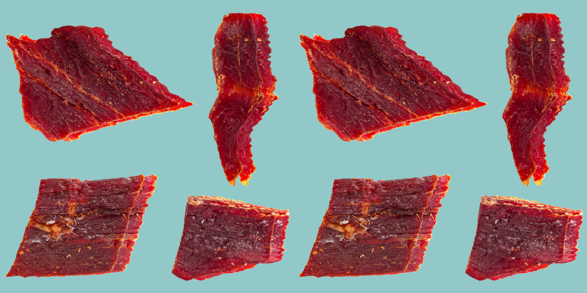 Beef jerky against a blue background