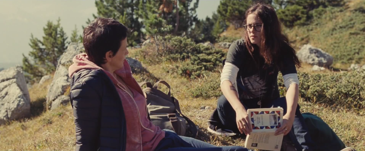 Val and Maria in the mountains reading a play