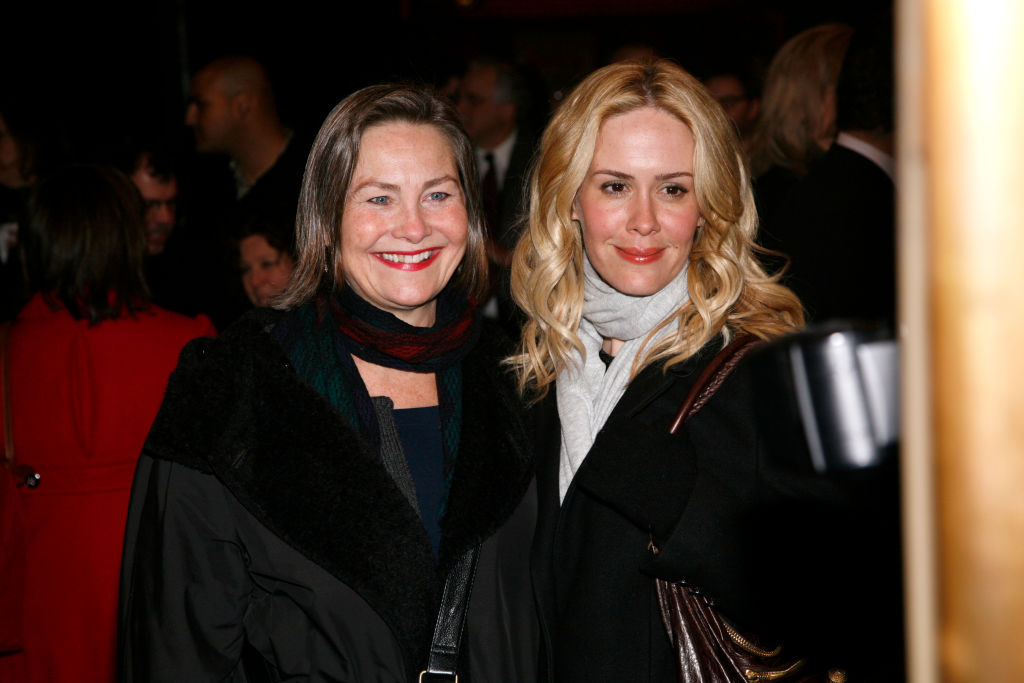 Cherry Jones and Sarah Paulson attend Opening Night for THE AMERICAN PLAN. Cherry is wearing a black coat, and Sarah is wearing a light blue turtleneck under a black coat.