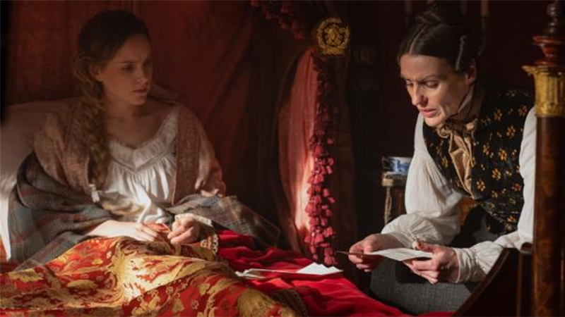 Anne Lister reads Ann Walker a letter in bed