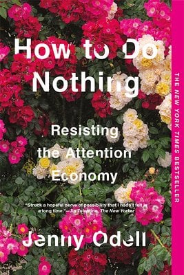 Cover of How to Do Nothing featuring the title text among a bed of colorful flowers