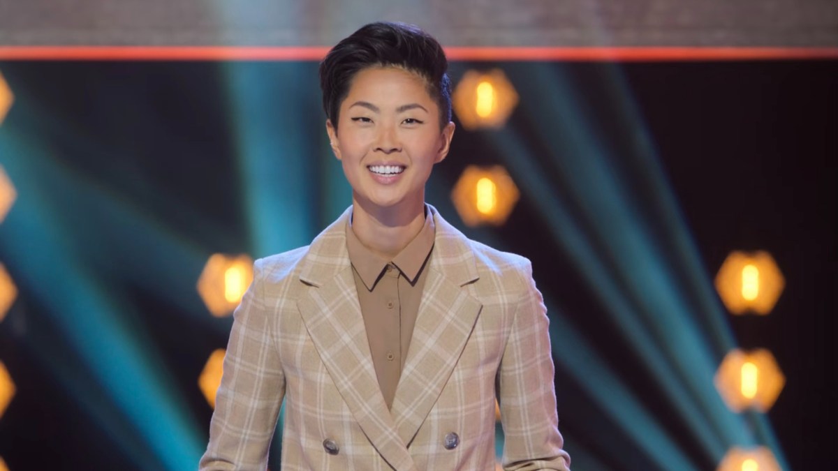 Kristen Kish in a brown plaid suit