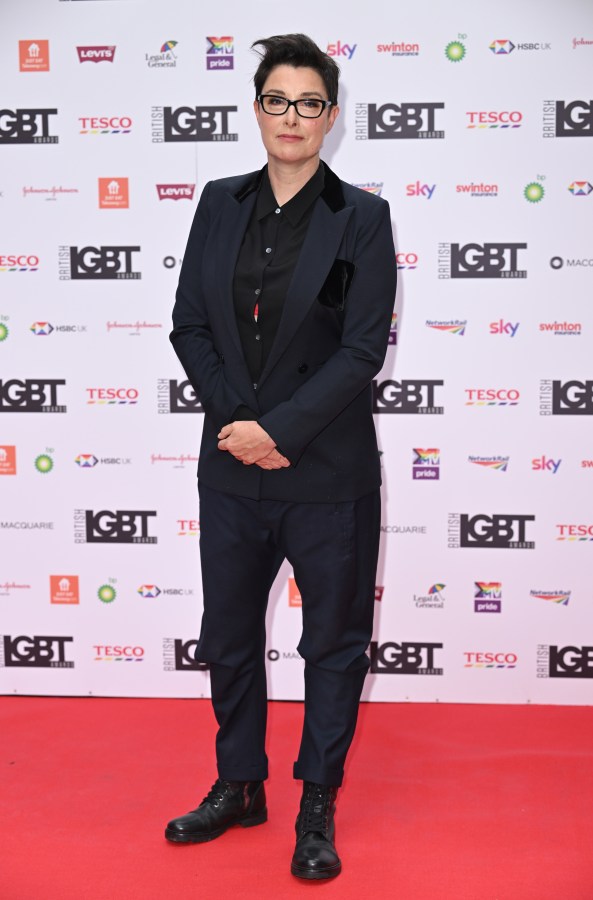 Sue Perkins in a navy blue suit