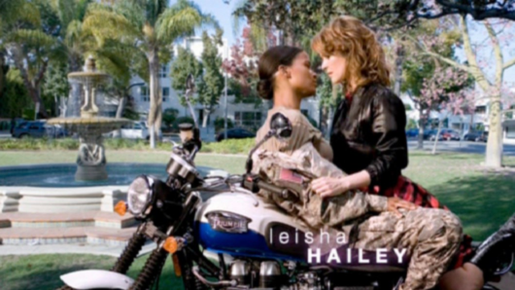 alice and tasha on a motorcycle