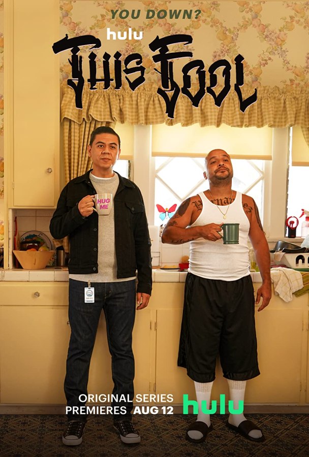 the image for this fool shows two men standing in a kitchen with coffee cups. they are mirroring each others body language.