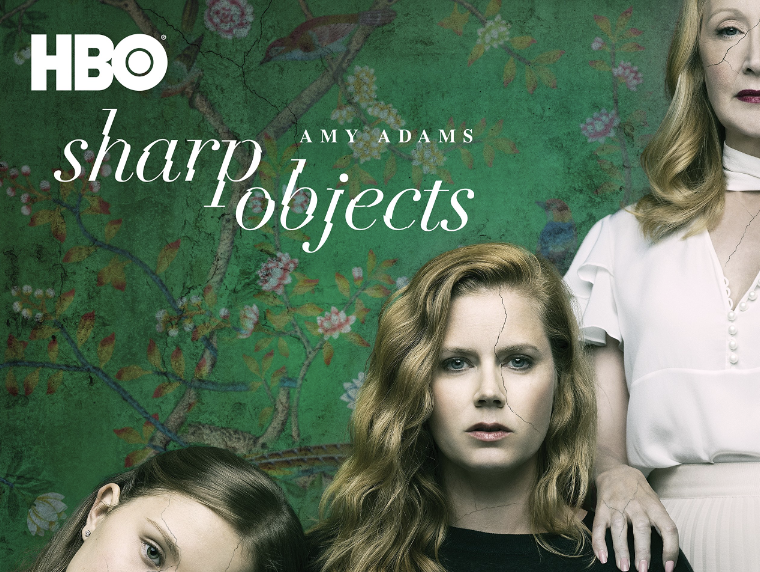 the cover of sharp objects shows Amy Adams with the character who plays her mother putting her hand on her shoulder and the character who plays her sister leaning on her other shoulder