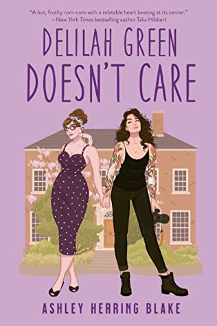 the cover of delilah doesn't care has an illustration of a femme person in a form fitting polka dott dress holding hands with a tattooed woman in a black jumpsuit holding a camera