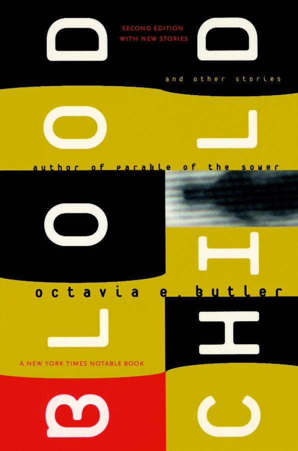 the title is set sideways, each letter on a different yellow, black or red color block