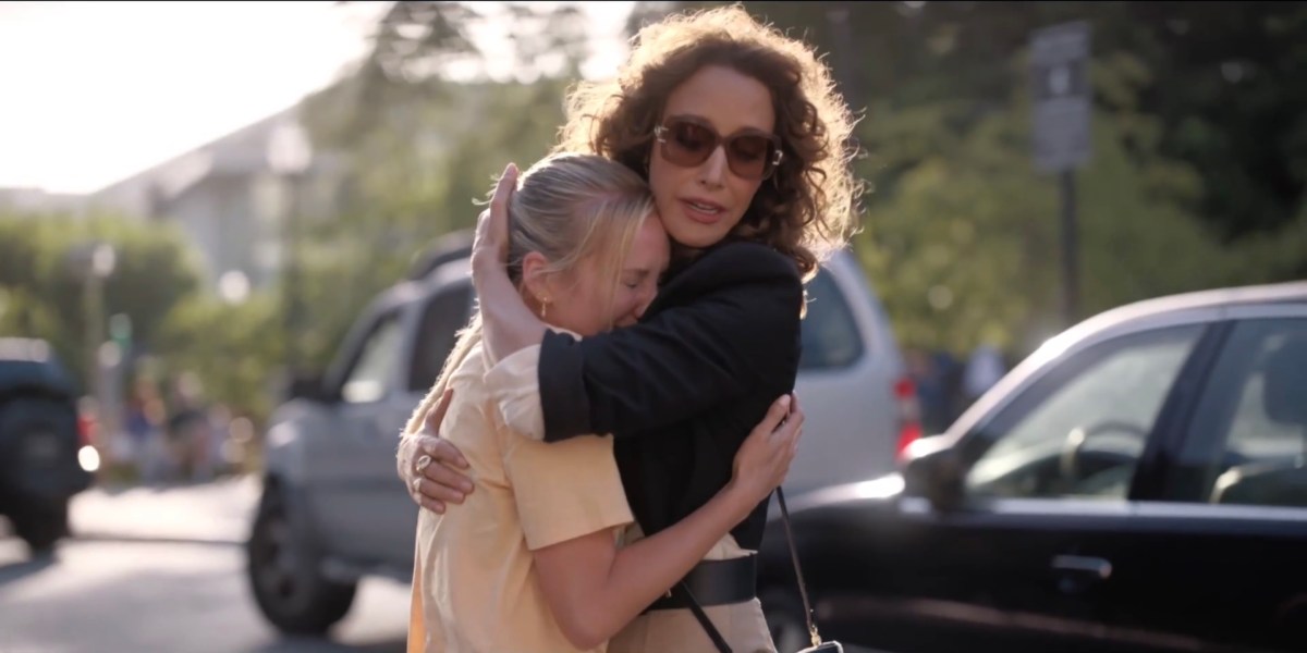 Bette hugging the girl whose car she hit