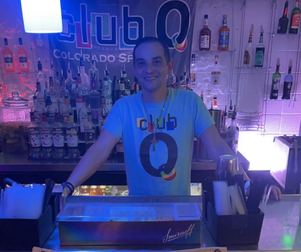 Derrick Rump behind the Bar at Club Q