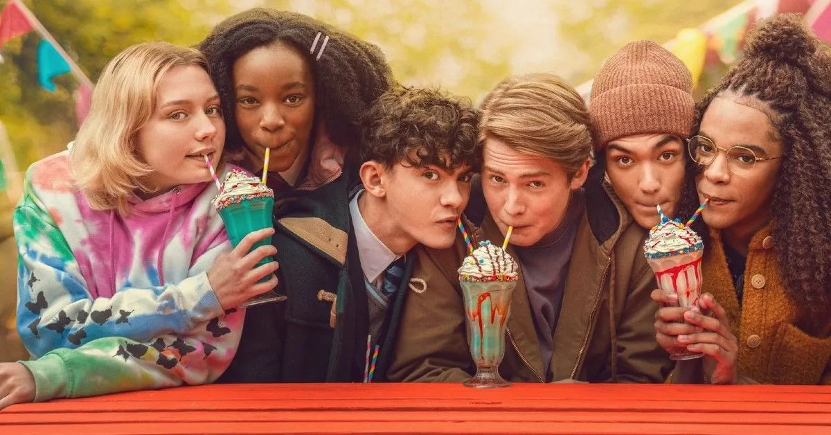 the cast of heartstopper on netflix all drinking milkshakes